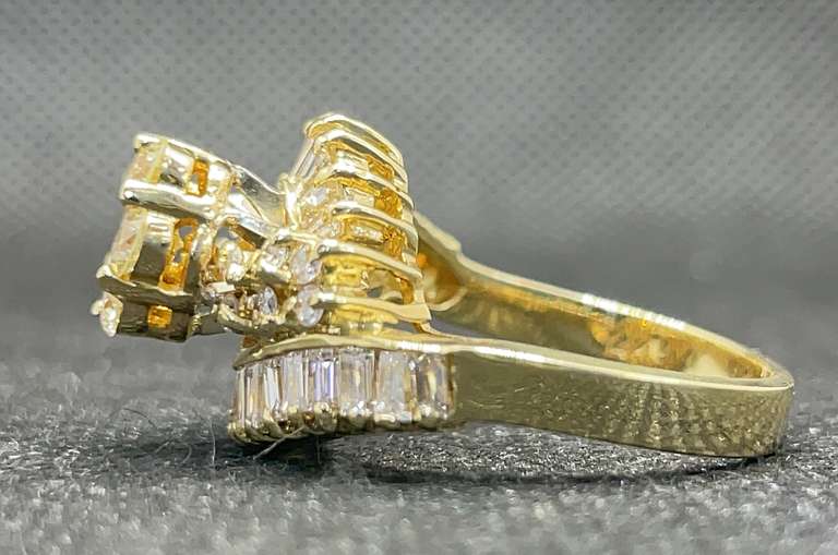 2.50 CARATS T.W. COCKTAIL RING WITH ROUND AND BAGUETTE DIAMOND RING IN 14KYELLOW GOLD