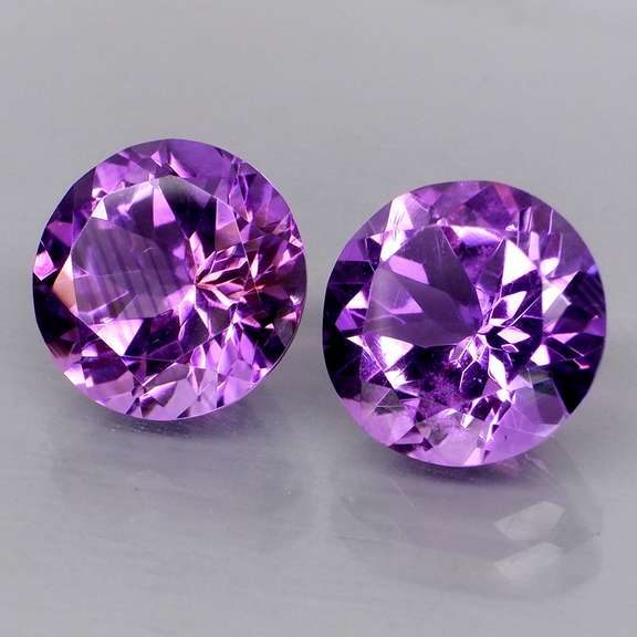 Stunning 6.43ct violet Amethyst solitaire pair
