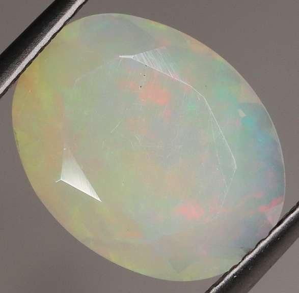 Full cover! 2.63ct rolling floral flashing Welo Opal