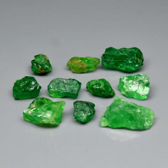 Untreated 24.97ct collectors uncut Tsavorite Garnet set