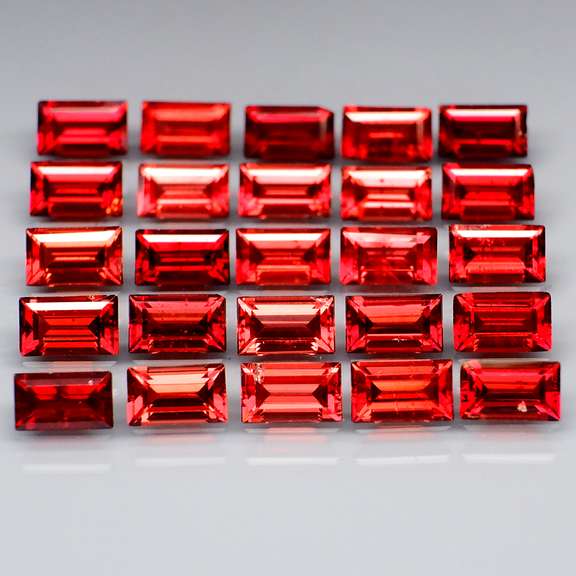 Nice 8.13ct emerald cut cherry red Garnet set