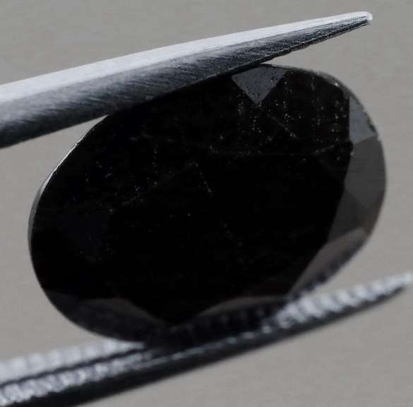 Sultry 3.40ct blue black oval cut Sapphire