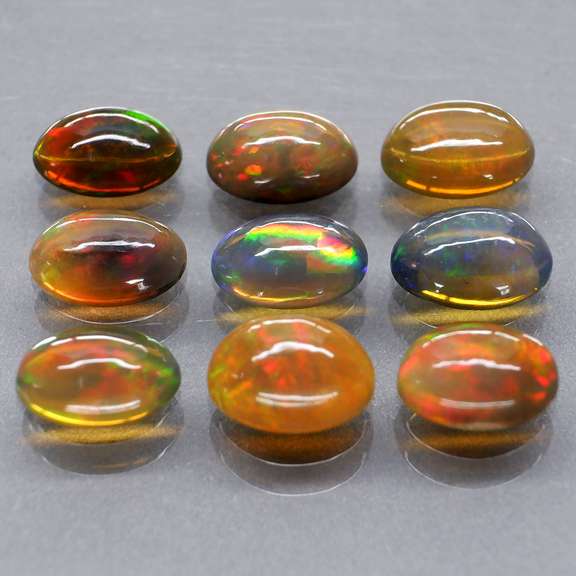 Excellent 4.46ct 9 piece Ethiopian black opal set