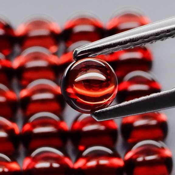 Incredible 8.75ct open color Mozambique Garnet cabochon set