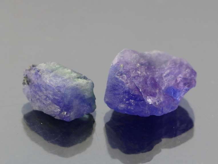 Stunning 36.43ct rich blue violet uncut Tanzanite pair