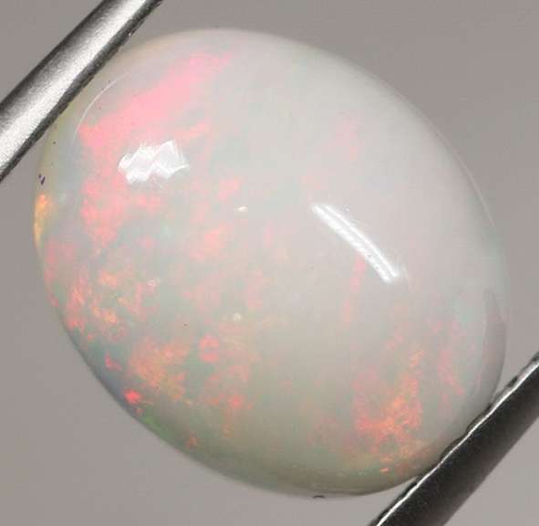 Beautiful 2.40ct rolling floral flashing Welo Opal