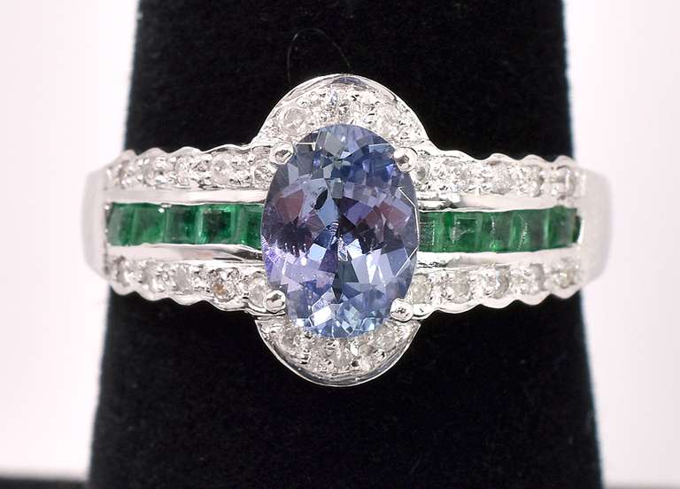 Sparkling Purple Tanzanite And Emerald Ring In 14K White Gold