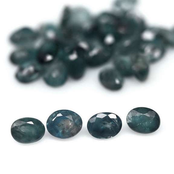 Heated only! 7.05ct oval cut Sapphire set