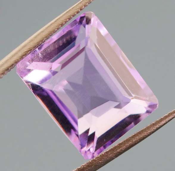 Bright violet 7.49ct emerald cut Amethyst