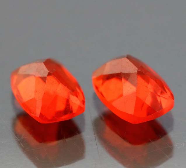 Vibrant top color 1.61ct bright orange Fire Opal pair