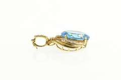 14K Yellow Gold Oval Blue Topaz Diamond Accent Elaborate Pendant