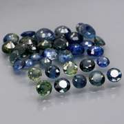 Heated only! 7.24ct blue green Sapphire set