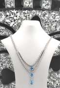Unconventional 18kt Blue Topaz 3 Oval w RBC Diamond Necklace