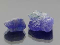 Stunning 36.43ct rich blue violet uncut Tanzanite pair