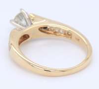 Elegant Round Brilliant Cut and Channel Set Diamond Engagement Ring in Yellow Gold