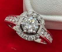 CERTIFIED LADIES 18K WHITE GOLD AND DIAMOND RING