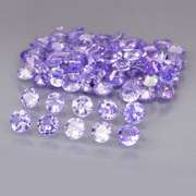 Glittering 4.36ct bright blue violet Tanzanite set