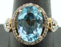 Charming Gold Plated Silver Topaz Ring with Diamond Accents