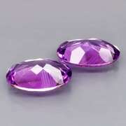 Glittering 8.78ct violet Amethyst pair
