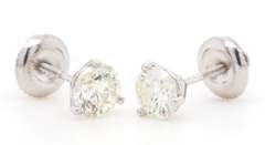Elegant 1.09ctw Round Diamond Solitaire Stud Earrings in 14K