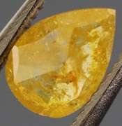 Rare .40ct pear cut golden Diamond