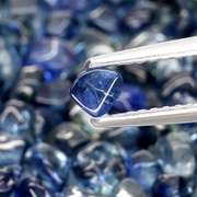 Really heavy and richly colored 30.90ct Sapphire set