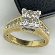 14K YELLOW GOLD AND DIAMOND RING.