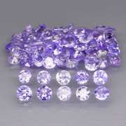 Heavy flashing 4.57ct diamond cut Tanzanite set