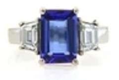 Quintessential Emerald Cut Tanzanite and Trapezoid Diamond Ring