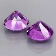 Glittering 6.99ct violet Amethyst solitaire pair