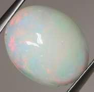 Beautiful 2.40ct rolling floral flashing Welo Opal