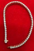 CERTIFIED 18K GOLD AND DIAMOND TENNIS BRACELET