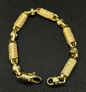 UNIQUE MENS DIAMOND LINK BRACELET WITH 6.75 CARATS OF ROUND BRILLIANT DIAMONDS IN 14K YELLOW GOLD.