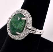 Brilliant 6.50CTS Oval Shaped Cabochon-Cut Natural Emerald & 1.50CTW White Sapphire Ring in Sterling Silver
