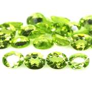 Dazzling 8.49ct untreated apple green Peridot set