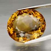 Glistening 23.11ct oval cut rich golden Citrine