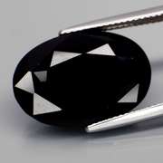 Silky 11.51ct silky black Loas Tektite