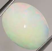 Full cover! 2.63ct rolling floral flashing Welo Opal