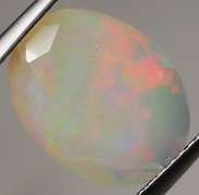 Full cover! 2.63ct rolling floral flashing Welo Opal