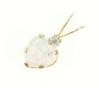 10K Yellow Gold Heart Syn. Opal CZ Accent Love Symbol Pendant