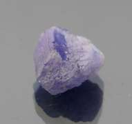 Collectors 14.72ct rich blue violet uncut Tanzanite