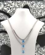 Unconventional 18kt Blue Topaz 3 Oval w RBC Diamond Necklace