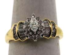 Exquisite Oval Diamond Halo Ring with Baguette Diamonds and a 14k Gold Band