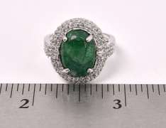 Brilliant 6.50CTS Oval Shaped Cabochon-Cut Natural Emerald & 1.50CTW White Sapphire Ring in Sterling Silver