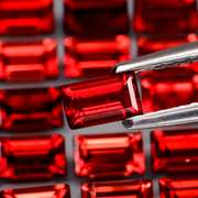 Nice 8.13ct emerald cut cherry red Garnet set