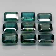 Heated only! 5.32ct blue green sapphire set