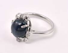 Stunning 7.01CTS Blue Cabochon-Cut Star Sapphire & 0.17CTW Diamond Ring in Sterling Silver