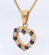 Charming Sapphire and Diamond Heart Shaped Pendant on Chain
