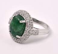 Brilliant 6.50CTS Oval Shaped Cabochon-Cut Natural Emerald & 1.50CTW White Sapphire Ring in Sterling Silver