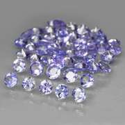 Heavy flashing 3.32ct diamond cut Tanzanite set